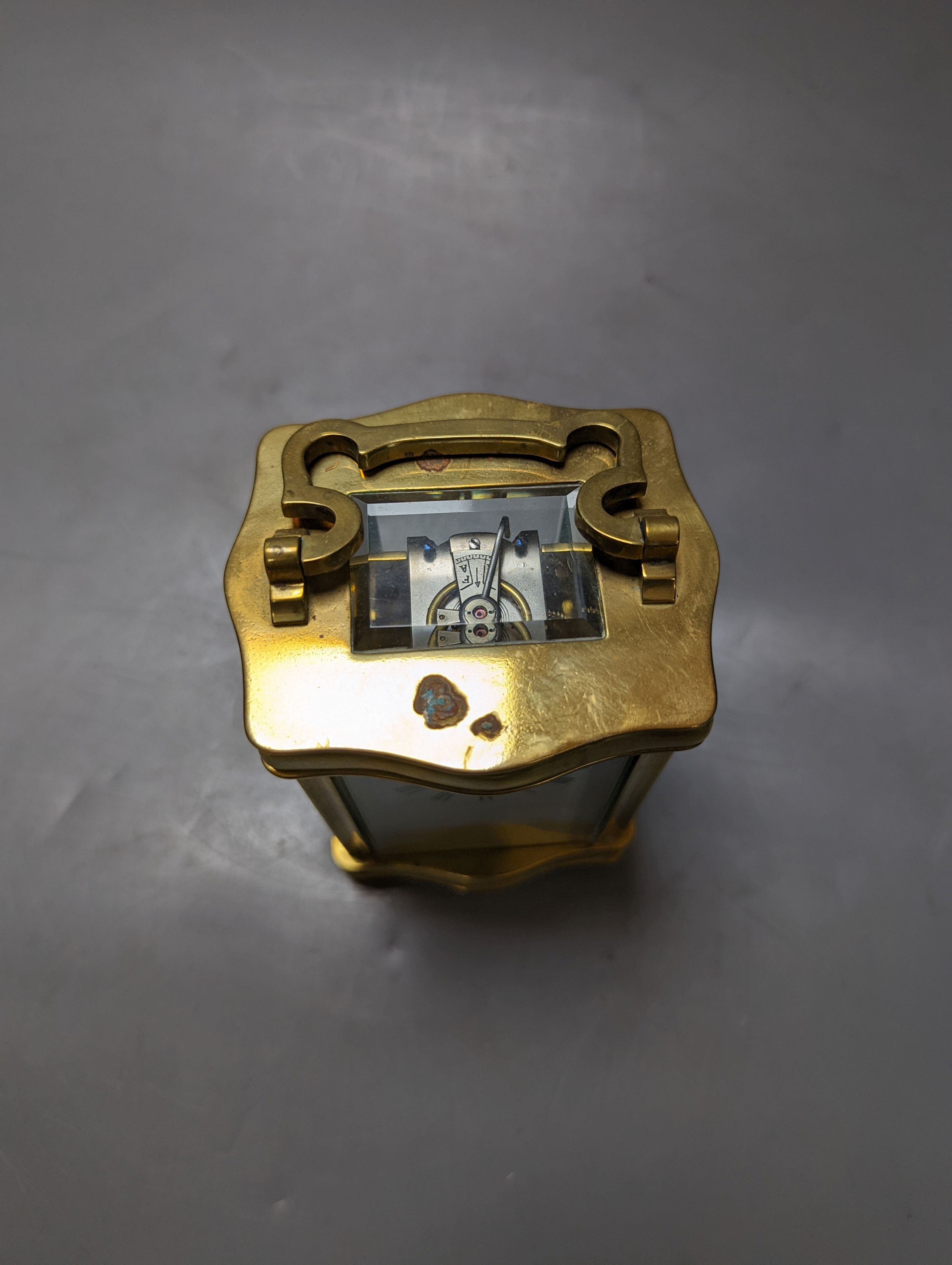 A brass cased carriage timepiece